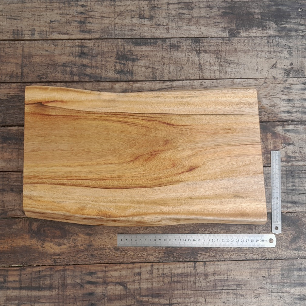 Camphor Laurel cutting board with live edge