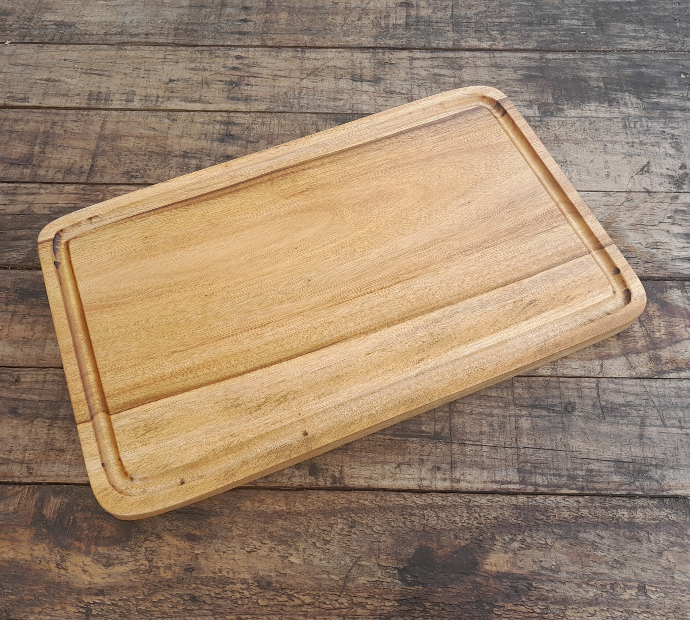Camphor Laurel cutting board with moat