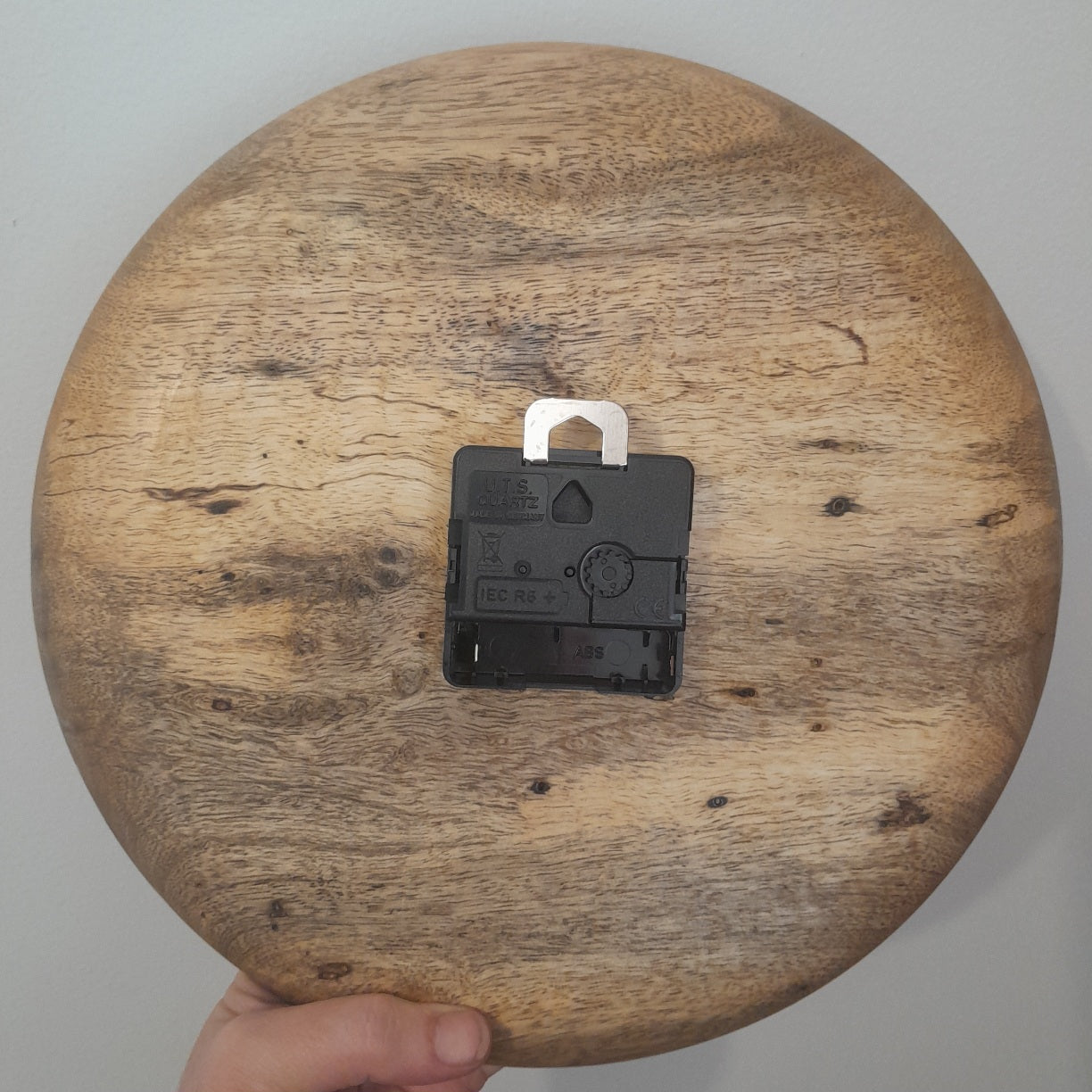 Turned wooden clock with German-made movement - Spalted Mango